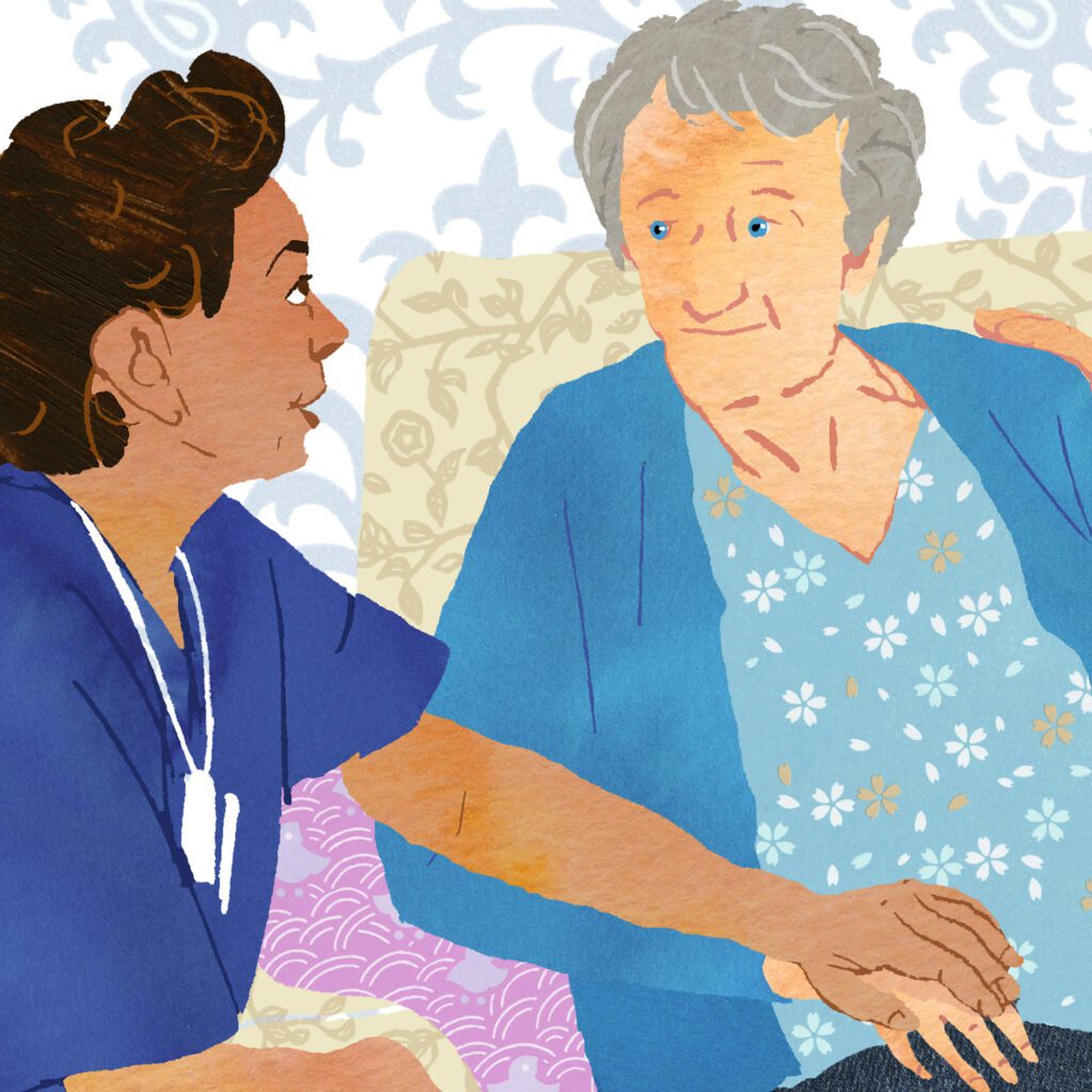 Caregiver comforting patient in palliative care setting