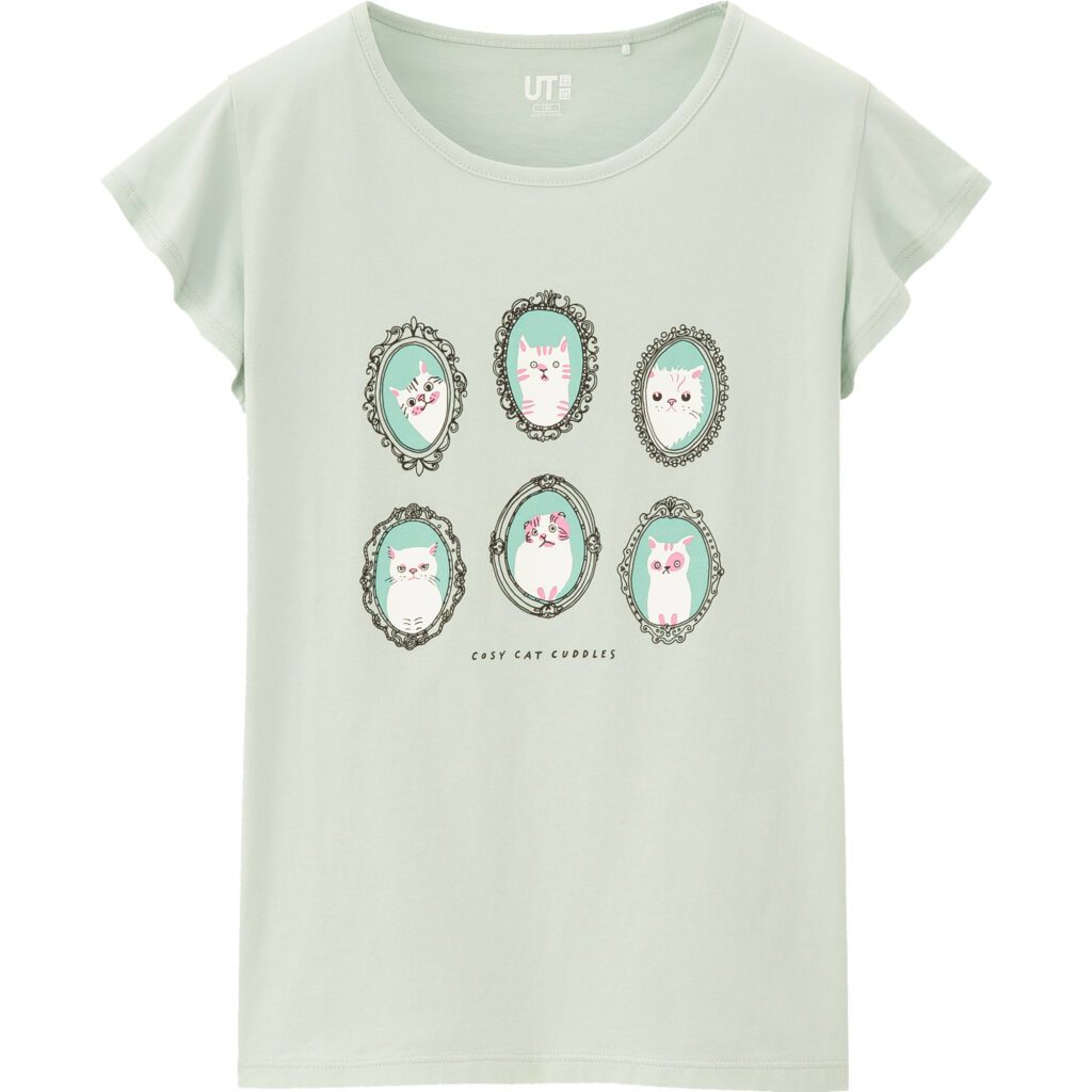 Mint green Uniqlo Kids T-shirt featuring Marie Åhfeldt’s cat cameo illustrations.